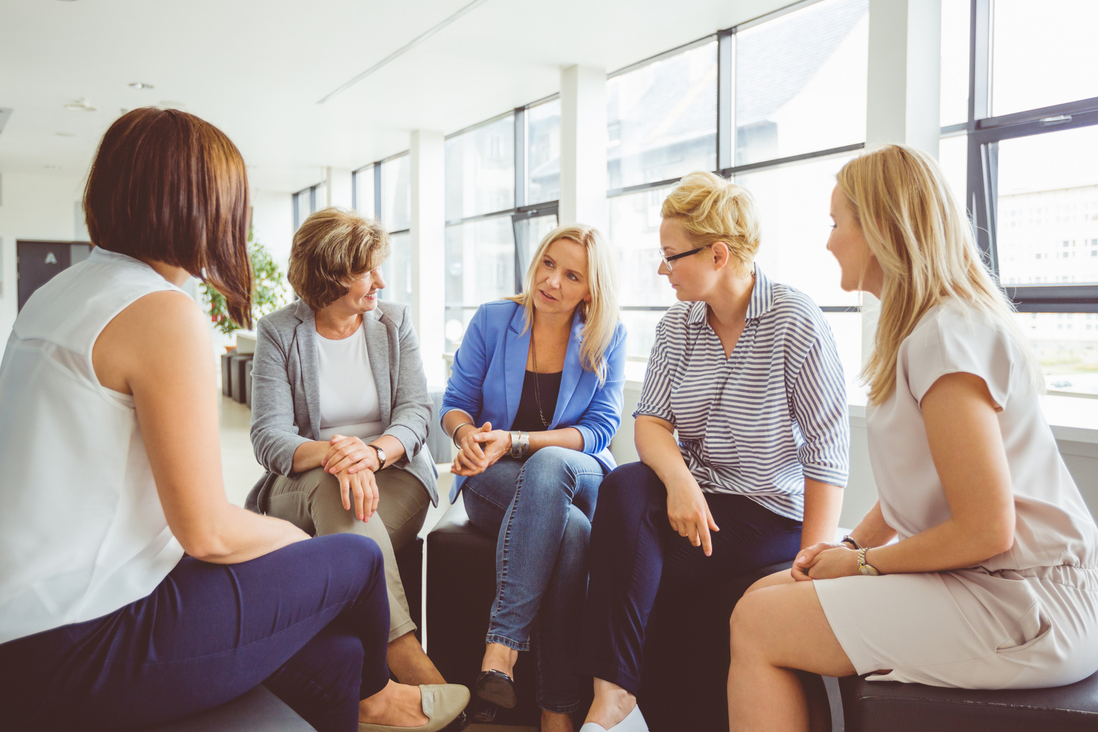 Group therapy session of women